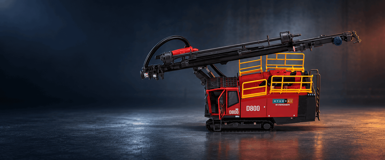 Hyundai Everdigm D800 blasting drill rig miniature in a dark industrial studio