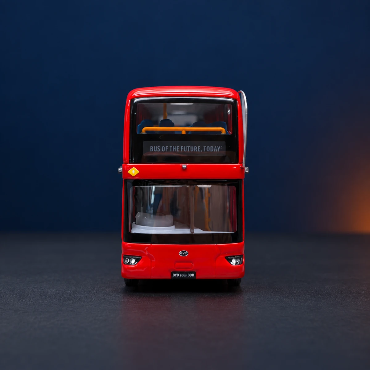 Front view of the BYD bus miniature showing the windscreen and mirrors