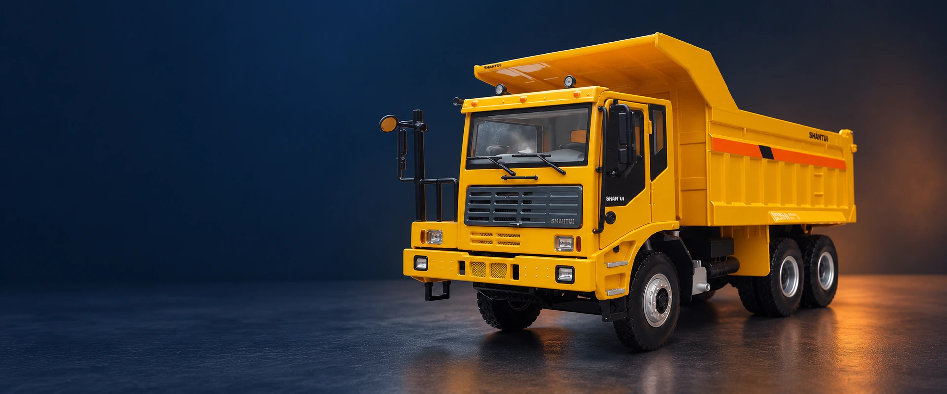 Shantui mining dump truck scale model on a dark industrial studio background