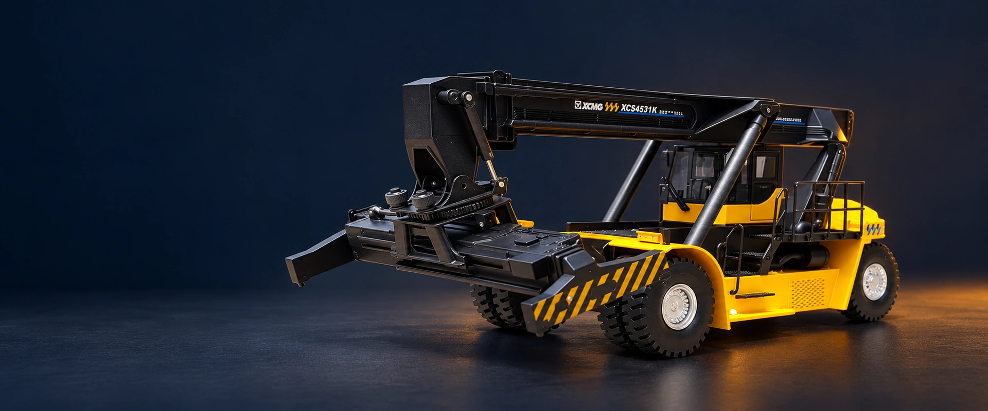 Yellow and black 1:35 XCMG XCS4531K reach stacker scale model with its boom lowered