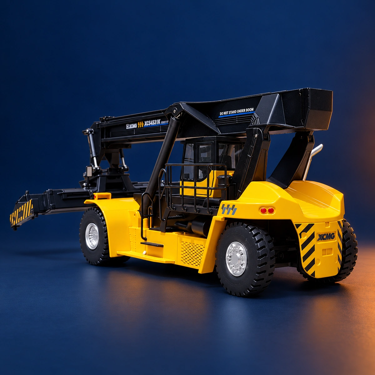 Rear three-quarter view showing the yellow counterweight, rear lights and wheels