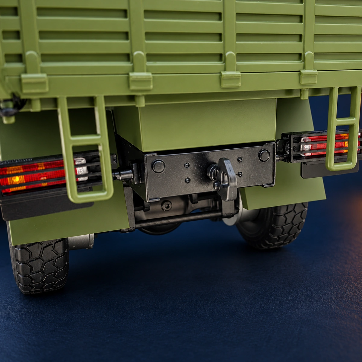Rear of the model showing coloured tail-light elements, access steps and central tow hitch